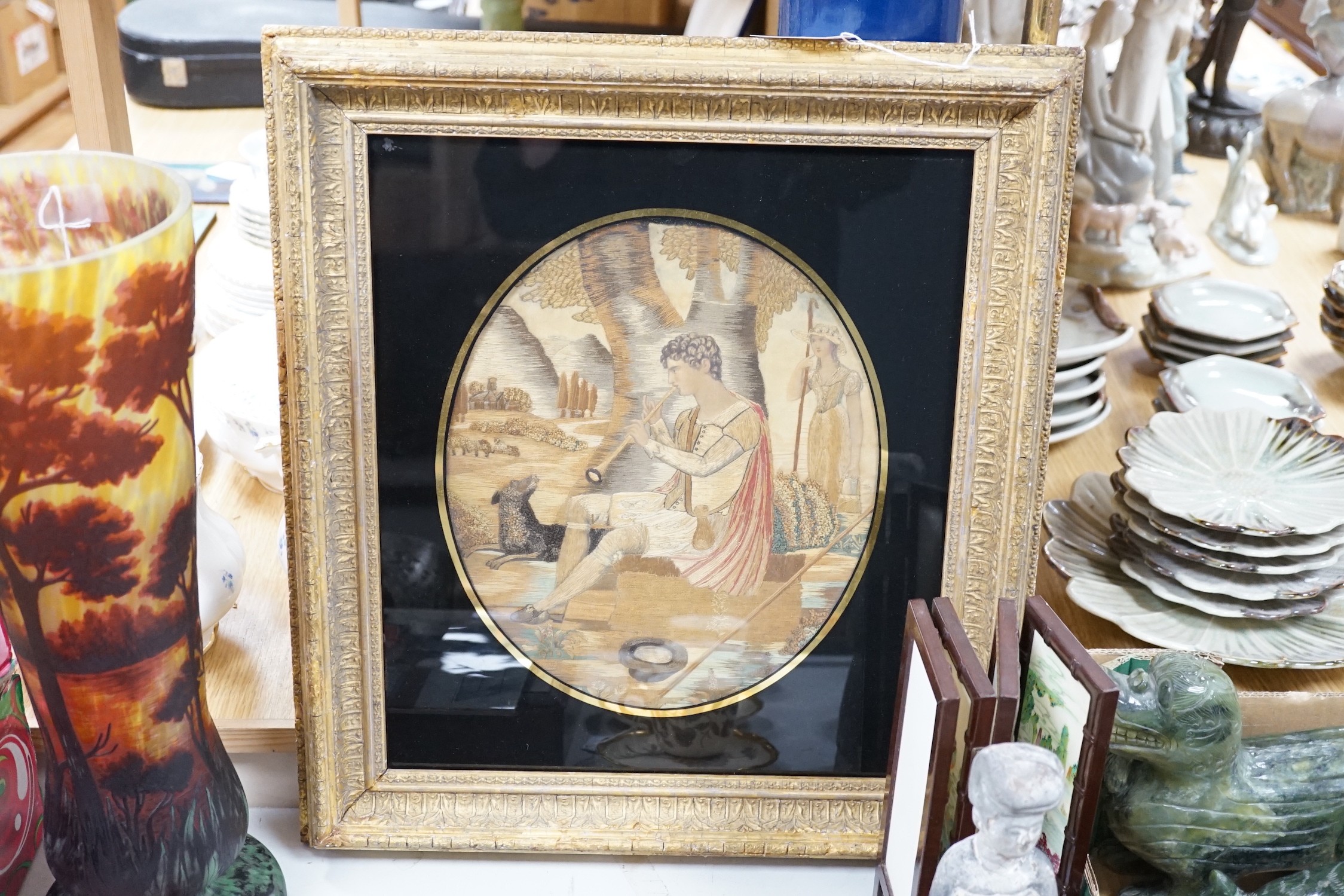 A framed Regency silkwork picture